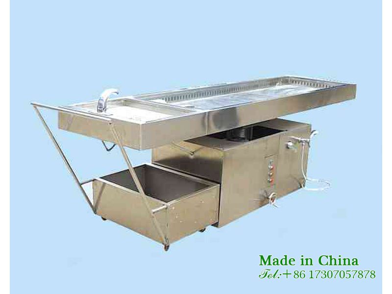 Elevating autopsy table